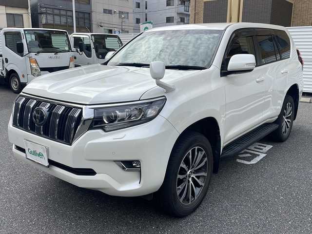 トヨタ ランドクルーザー プラド TX Lパッケージ 広島県 2020(令2)年 2.7万km ホワイトパールクリスタルシャイン /登録時走行距離/　　　　　　　26421キロ/ワンオーナー/4WD/純正ナビ/バックカメラ/地デジ/黒革シート/エアシート/PCS/スペアキー×１/ビルトインETC/新車時整備手帳/　　【保証書】/取扱説明書/