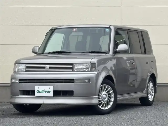 トヨタ ｂＢ Z Xバージョン 茨城県 2005(平17)年 0.9万km グレーM 純正ナビ/フロントフォグランプ/電動格納ミラー/純正アルミホイール/プライバシーガラス/革巻きステアリングホイール/取扱説明書