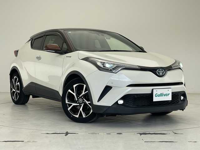 トヨタ Ｃ－ＨＲ G モード ブルーノ 沖縄県 2019(令1)年 5.8万km ダークブラウンマイカメタリック/ホワイトパールクリスタルシャイン 純正９インチナビ(NSZT-Y68T)　/(フルセグＴＶ　ＣＤ　ＤＶＤ　Bluetooth)　/バックカメラ　/ＥＴＣ　/ドライブレコーダー前後　/トヨタセーフティセンス/・衝突被害軽減ブレーキ (プリクラッシュセーフティ)																																																	/・追従ドライブ支援機能 (レーダークルーズコントロール)																									/・車線はみ出しアラート (レーンディパーチャーアラート)																									/・自動ハイビーム (オートマチックハイビーム)																									/ハーフレザー/シートヒーター　/ステアリングスイッチ/コーナーセンサー　　/ＢＳＭ　/ＬＥＤヘッドライト/オートライト/純正フロアマット/純正18インチアルミホイール/ドアバイザー/保証書/取扱説明書