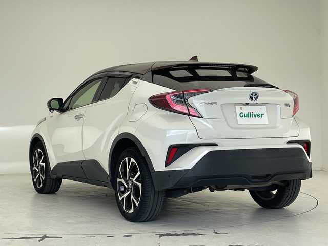 トヨタ Ｃ－ＨＲ G モード ブルーノ 沖縄県 2019(令1)年 5.8万km ダークブラウンマイカメタリック/ホワイトパールクリスタルシャイン 純正９インチナビ(NSZT-Y68T)　/(フルセグＴＶ　ＣＤ　ＤＶＤ　Bluetooth)　/バックカメラ　/ＥＴＣ　/ドライブレコーダー前後　/トヨタセーフティセンス/・衝突被害軽減ブレーキ (プリクラッシュセーフティ)																																																	/・追従ドライブ支援機能 (レーダークルーズコントロール)																									/・車線はみ出しアラート (レーンディパーチャーアラート)																									/・自動ハイビーム (オートマチックハイビーム)																									/ハーフレザー/シートヒーター　/ステアリングスイッチ/コーナーセンサー　　/ＢＳＭ　/ＬＥＤヘッドライト/オートライト/純正フロアマット/純正18インチアルミホイール/ドアバイザー/保証書/取扱説明書