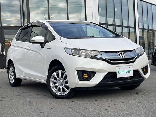 ホンダ フィット ハイブリット Fパッケージ 青森県 2014(平26)年 8.4万km プレミアムホワイトパール ・4WD/・純正ナビ/・ワンセグ/・CD/DVD/Bluetooth/・バックカメラ/・衝突被害軽減ブレーキ/・ワイパーデアイサー/・オートライト/・LEDヘッドライト/・LEDフォグランプ/・ETC/・横滑り防止装置/・アイドリングストップ/・純正フロアマット/・社外AW15インチ/・電動格納ミラー/・スマートキー/・スペアキー有