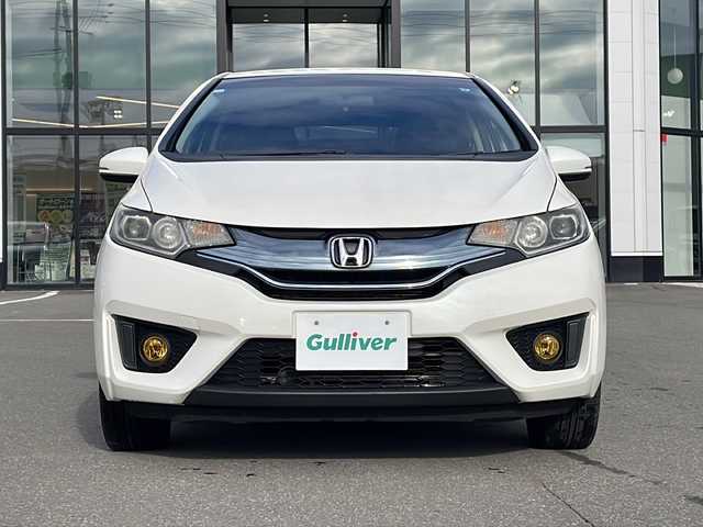 ホンダ フィット ハイブリット Fパッケージ 青森県 2014(平26)年 8.4万km プレミアムホワイトパール ・4WD/・純正ナビ/・ワンセグ/・CD/DVD/Bluetooth/・バックカメラ/・衝突被害軽減ブレーキ/・ワイパーデアイサー/・オートライト/・LEDヘッドライト/・LEDフォグランプ/・ETC/・横滑り防止装置/・アイドリングストップ/・純正フロアマット/・社外AW15インチ/・電動格納ミラー/・スマートキー/・スペアキー有