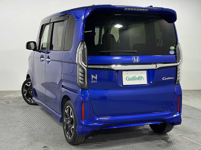 ホンダ Ｎ ＢＯＸ カスタム G L ターボ ホンダセンシング 広島県 2018(平30)年 2.8万km ブリリアントスポーティブルーメタリック2トーン ホンダセンシング/・衝突軽減ブレーキ/・誤発進抑制機能/後方誤発進抑制機能/・歩行者事故低減ステアリング/・先行車発進お知らせ機能/・アダプティブクルーズコントロール/・車線維持支援システム/・標識認識機能/・路外逸脱抑制機能/純正ナビ/・フルセグTV/・Bluetooth/・CD/DVD/両側電動パワースライドドア/バックカメラ/ETC/ステアリングスイッチ/革巻きステアリング/LEDヘッドライト