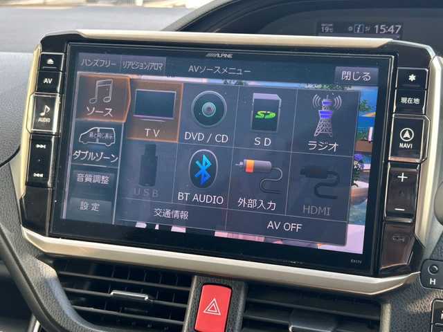 トヨタ エスクァイア ハイブリッド Xi 広島県 2015(平27)年 10.8万km ホワイトパールクリスタルシャイン モデリスタエアロ/モデリスタ17インチアルミホイール/片側パワースライドドア/アルパインビックX11インチナビ/　（DVD/CD/SD/BT/フルセグTV）/アルパインフリップダウンモニター/バックカメラ/ステアリングリモコン/ビルトインETC/前方ドライブレコーダー/前席ヒートシーター/オートリトラミラー/LEDヘッドライト/オートライト/フォグランプ/純正フロアマット/スペアキー/横滑り防止装置/盗難防止装置/保証書/取扱説明書