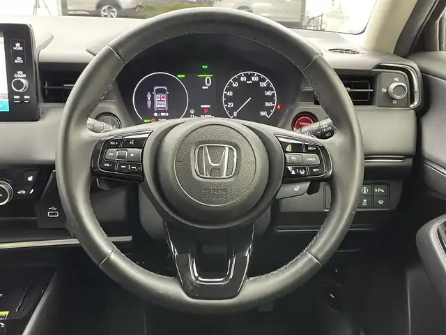 ホンダ ヴェゼル ハイブリッド e:HEV Z 宮城県 2021(令3)年 3万km クリスタルブラックパール 純正9インチナビ(LXM-242ZFNi)/フルセグTV/FM/AM/BT/バックカメラ/クルーズコントロール追従走行有/ETC2.0/前後ドライブレコーダー/シートヒーター/ステアリングヒーター/パドルシフト/電動リアゲート/電子制御パーキングブレーキ/オートマチックブレーキホールド/ハンズフリーパワーバック/ワイヤレス充電器/安全支援情報スイッチ/横滑り防止装置/踏み間違い衝突被害軽減システム/ブラインドスポットモニター/コーナーセンサー/レーンキープアシスト/衝突被害軽減システム/オートマチックハイビーム/フォグランプ