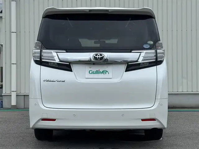 トヨタ ヴェルファイア X 富山県 2016(平28)年 6.9万km ホワイトパールクリスタルシャイン 社外ナビ(AVIC-RZ77)/AM/FM/CD/DVD/Bluetooth/フルセグTV/カロッツェリアフリップダウンモニター/バックカメラ/プリクラッシュセーフティ/両側パワースライドドア/LEDヘッドライト/レーダークルーズコントロール/コーナーセンサー/ETC/プッシュスタート/スペアキー1本/横滑り防止装置/ブレーキホールド/純正16インチアルミホイール