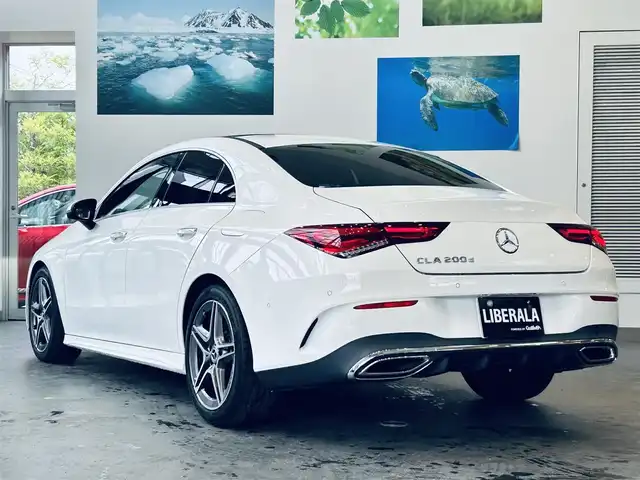 メルセデス・ベンツ ＣＬＡ２００ｄ AMGライン 大阪府 2019(令1)年 1.9万km ポーラホワイト レザーエクスクルーシブP/アドバンスドP/レーダーセーフティP/サンルーフ/HUD/赤黒革/メモリ付きパワーシート/シートヒーター/純正ナビ/TV/360度カメラ/ACC/ブラインドスポット/純正18インチAW/LEDヘッドライト/アンビエントライト/ETC/ドラレコ/レーダー探知機/ワイヤレス充電