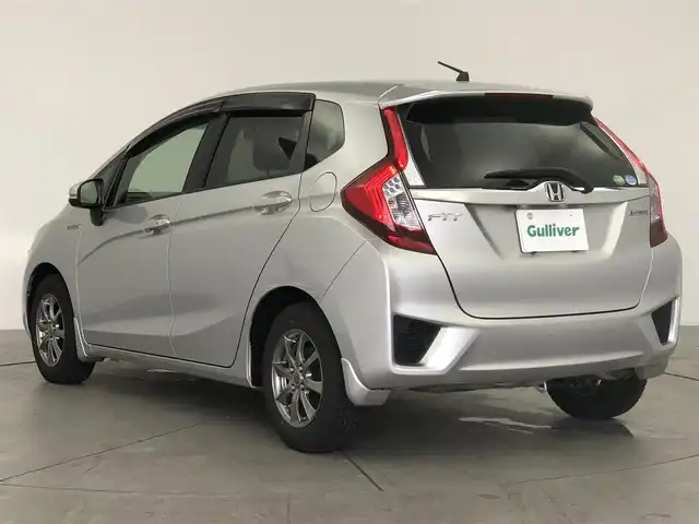 ホンダ フィット ハイブリット Lパッケージ 愛知県 2014(平26)年 10.9万km アラバスターシルバーメタリック 純正7インチナビ/クルコン/バックカメラ/ドラレコ/ETC/横滑り防止/オートライト/ドアバイザー/鉄チン付き夏タイヤ4本車載