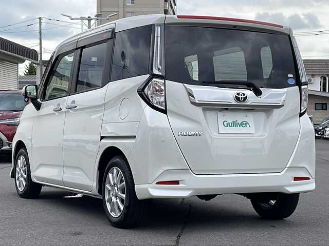 トヨタ ルーミー カスタムG 道北・旭川 2020(令2)年 2.4万km パールホワイトⅢ ・寒冷地仕様/・禁煙車/・４WD/・純正SDナビ/　CD/DVD/BT/SD/TV/・バックカメラ/・両側パワースライドドア/・衝突軽減ブレーキ/・横滑り防止/・レーンキープアシスト/・オートライト/・オートマチックハイビーム/・アイドリングストップ/・レーダークルーズコントロール/・スペアキー/・ETC/・純正エンジンスターター/・LEDヘッドライト/フォグランプ/・革巻きステアリング/・ステアリングリモコン/・純正AW付き夏タイヤ積込/・保証書/・純正フロアマット