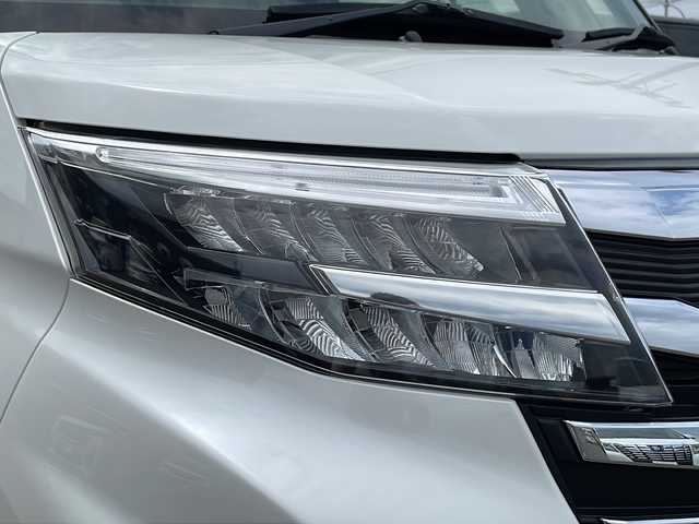 トヨタ ルーミー カスタムG 道北・旭川 2020(令2)年 2.4万km パールホワイトⅢ ・寒冷地仕様/・禁煙車/・４WD/・純正SDナビ/　CD/DVD/BT/SD/TV/・バックカメラ/・両側パワースライドドア/・衝突軽減ブレーキ/・横滑り防止/・レーンキープアシスト/・オートライト/・オートマチックハイビーム/・アイドリングストップ/・レーダークルーズコントロール/・スペアキー/・ETC/・純正エンジンスターター/・LEDヘッドライト/フォグランプ/・革巻きステアリング/・ステアリングリモコン/・純正AW付き夏タイヤ積込/・保証書/・純正フロアマット