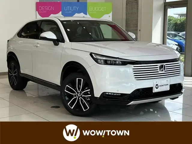 ホンダ ヴェゼル ハイブリッド e:HEV Z 埼玉県 2025(令7)年 0.1千km プラチナホワイトパール ホンダセンシング/純正9インチナビ/ BT/USB/フルセグ/バックカメラ/ハーフレザーシート/シートヒーター/パワーバックドア/純正18インチアルミホイール/コーナーセンサー/ステアリングヒーター/ワイヤレス充電/オートブレーキホールド/レーダークルーズコントロール/レーンキープアシスト/ETC2.0/スマートキー×2/禁煙車