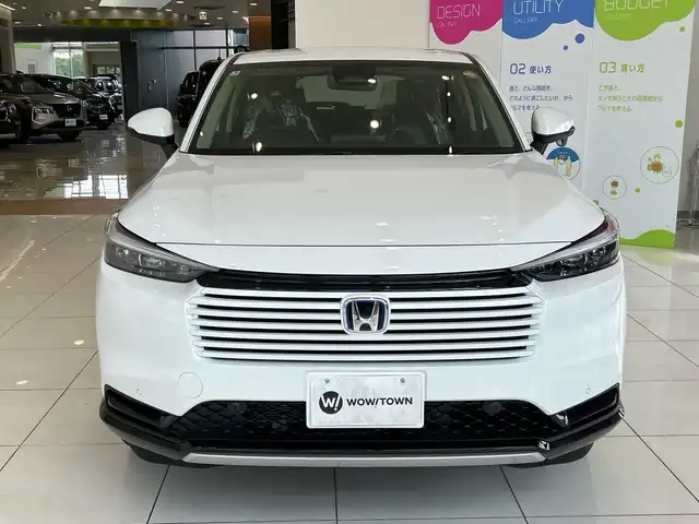 ホンダ ヴェゼル ハイブリッド e:HEV Z 埼玉県 2025(令7)年 0.1千km プラチナホワイトパール ホンダセンシング/純正9インチナビ/ BT/USB/フルセグ/バックカメラ/ハーフレザーシート/シートヒーター/パワーバックドア/純正18インチアルミホイール/コーナーセンサー/ステアリングヒーター/ワイヤレス充電/オートブレーキホールド/レーダークルーズコントロール/レーンキープアシスト/ETC2.0/スマートキー×2/禁煙車