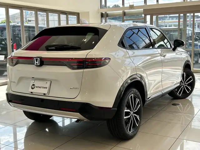 ホンダ ヴェゼル ハイブリッド e:HEV Z 埼玉県 2025(令7)年 0.1千km プラチナホワイトパール ホンダセンシング/純正9インチナビ/ BT/USB/フルセグ/バックカメラ/ハーフレザーシート/シートヒーター/パワーバックドア/純正18インチアルミホイール/コーナーセンサー/ステアリングヒーター/ワイヤレス充電/オートブレーキホールド/レーダークルーズコントロール/レーンキープアシスト/ETC2.0/スマートキー×2/禁煙車