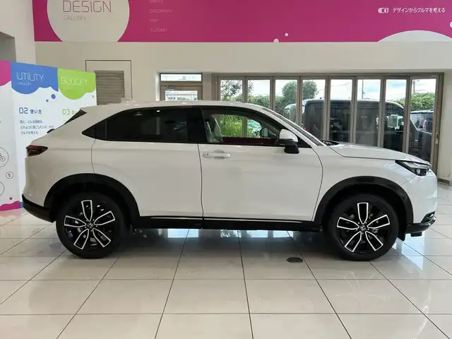 ホンダ ヴェゼル ハイブリッド e:HEV Z 埼玉県 2025(令7)年 0.1千km プラチナホワイトパール ホンダセンシング/純正9インチナビ/ BT/USB/フルセグ/バックカメラ/ハーフレザーシート/シートヒーター/パワーバックドア/純正18インチアルミホイール/コーナーセンサー/ステアリングヒーター/ワイヤレス充電/オートブレーキホールド/レーダークルーズコントロール/レーンキープアシスト/ETC2.0/スマートキー×2/禁煙車