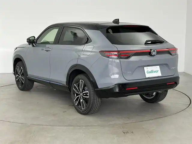 ホンダ ヴェゼル ハイブリッド e:HEV Z PLaYパッケージ 愛知県 2025(令7)年 0.1万km グレーⅡ ・純正ディスプレイナビ/（BT/Carplay/USB）/・フルセグTV/・バックカメラ/・電動パーキングシステム/・電動バックドア/・ハーフレザーシート/・前席シートヒーター/・ホンダセンシング/レーダークルーズコントロール/衝突軽減ブレーキ/レーンアシストシステム/ブラインドスポットモニター/コーナーセンサー/・クイック充電/・ステアリングヒーター/・パドルシフト/・純正１８インチAW/225/50/R18/・ETC2.0/・純正LEDライト/・保証書/・取扱説明書