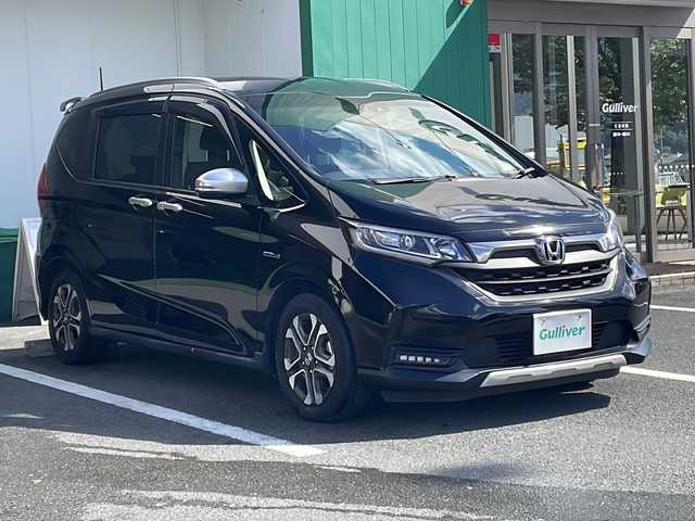 ホンダ フリード＋ ハイブリット クロスター ホンダセンシング 京都府 2020(令2)年 3.6万km クリスタルブラックパール 純正９インチナビ　Ｂｌｕｅｔｏｏｔｈオーディオ　ＤＶＤ再生　フルセグ　バックカメラ　レーダークルーズコントロール　レーンキープ　ビルトインＥＴＣ　ＬＥＤヘッドライト　両側パワースライドドア　純正アルミ