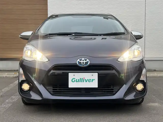 トヨタ アクア G 秋田県 2015(平27)年 15.2万km ダークバイオレットマイカメタリック 純正メモリナビ（CD/BT)/ワンセグ/バックカメラ/社外15インチアルミ（夏タイヤ装着）/スマートキー/アイドリングストップ/プッシュスタート/クルーズコントロール追従走行なし/車両接近通報装置/ステアリングスイッチ/純正フロアマット/社外ドアバイザー/ビルトインETC/オートライト/オートエアコン/パワーステアリング/パワーウィンドウ/ヘッドライトレベライザー/横滑り防止/寒冷地仕様/電動ウィンカーミラー/保証書/取扱説明書/記録簿/スペアキー×１