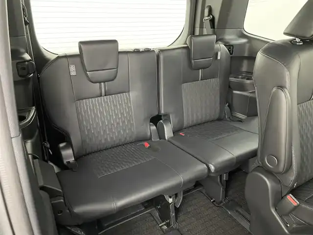 トヨタ ノア ハイブリッド S－Z 岡山県 2023(令5)年 1.3万km グリッターブラックガラスフレーク 純正10.5インチディスプレイオーディオナビ/・Bluetooth/地デジ/カープレイ/DVD/CD/HDMI/バックカメラ/純正14インチフリップダウンモニター/快適利便パッケージ/・後席シートヒーター /・パワーバックドア /・2列目オットマン/セーフティセンス /レーダークルーズコントロール/LEDライト/ハーフレザーシート /シートヒーター /ステアリングヒーター/ビルトインETC2.0/プッシュスタート /スマートキー/両側パワースライドドア/前後ドライブレコーダー/オートライト