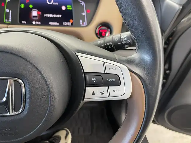 ホンダ フィット e:HEVリュクス 群馬県 2020(令2)年 2.6万km シャイニンググレーM 純正９インチナビ バックカメラ 前席シートヒーター ホンダセンシング 禁煙車 純正アルミホイール 前後ドラレコ ビルトインETC LEDヘッドライト オートライト ブレーキホールド プッシュスタート