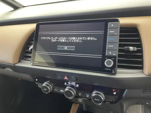 ホンダ フィット e:HEVリュクス 群馬県 2020(令2)年 2.6万km シャイニンググレーM 純正９インチナビ バックカメラ 前席シートヒーター ホンダセンシング 禁煙車 純正アルミホイール 前後ドラレコ ビルトインETC LEDヘッドライト オートライト ブレーキホールド プッシュスタート