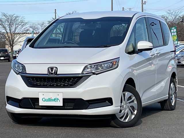 ホンダ フリード G 道央・札幌 2023(令5)年 2.9万km プラチナホワイトパール ４WD/社外メモリーナビ/AM/FM/BT/SD/CD/ワンセグ/ホンダセンシング/衝突被害軽減ブレーキ/横滑り防止装置/レーダークルーズコントロール/レーンキープアシスト/バックカメラ/コーナーセンサー/ビルトインETC/ドライブレコーダー/アイドリングストップ/ワイパーデアイサー/ECON/両側パワースライドドア/前席シートヒーター/ステアリングリモコン/プッシュスタート/スマートキー/LEDヘッドライト/オートライト/電動格納ミラー/ヒーテッドドアミラー/ウィンカーミラー/社外フロアマット/スペアキー/レンタカー登録