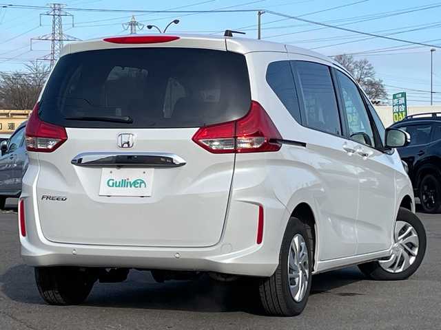 ホンダ フリード G 道央・札幌 2023(令5)年 2.9万km プラチナホワイトパール ４WD/社外メモリーナビ/AM/FM/BT/SD/CD/ワンセグ/ホンダセンシング/衝突被害軽減ブレーキ/横滑り防止装置/レーダークルーズコントロール/レーンキープアシスト/バックカメラ/コーナーセンサー/ビルトインETC/ドライブレコーダー/アイドリングストップ/ワイパーデアイサー/ECON/両側パワースライドドア/前席シートヒーター/ステアリングリモコン/プッシュスタート/スマートキー/LEDヘッドライト/オートライト/電動格納ミラー/ヒーテッドドアミラー/ウィンカーミラー/社外フロアマット/スペアキー/レンタカー登録