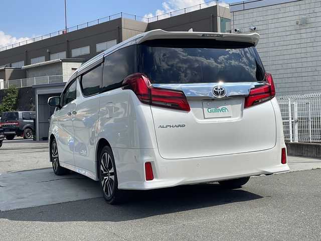 トヨタ アルファード S Cパッケージ 山梨県 2021(令3)年 2.6万km ホワイトパールクリスタルシャイン ナビ付きディスプレイオーディオ/JBLサウンド/フルセグ/後席モニタ/ＥＴＣ/衝突軽減装置/両側電動スライドドア/ステリングヒーター/ＢＳＭ/ドライブレコーダー/シートヒーター/シートベンチレーション