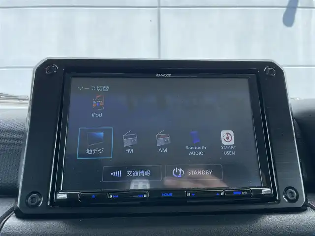 スズキ ジムニー シエラ JC 千葉県 2023(令5)年 1万km ミディアムグレー 衝突軽減ブレーキ/レーンキープアシスト/クルーズコントロール/社外メモリナビ/　フルセグ/BT/DVD/CD/USB/バックカメラ/ステアリングスイッチ/ETC/LEDヘッドライト/オートライト/フォグライト/スマートキー/プッシュスタート/純正フロアマット/純正AW積込/電動格納ミラー
