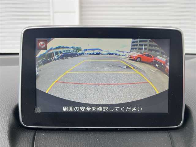 マツダ デミオ XD ツーリング 高知県 2015(平27)年 5.7万km ソウルレッドプレミアムメタリック フルセグテレビ/バックカメラ/アイドリングストップ/クルーズコントロール/ETC/ターボ/Bluetooth接続/純正ナビ/純正フロアマット/純正16インチアルミホイール/ABS/横滑り防止装置/レーンキープアシスト/盗難防止装置/オートライトオートマチックハイビーム/LEDヘッドライト/ダブル＋サイドエアバッグ/盗難防止装置/衝突被害軽減システム/バックカメラ