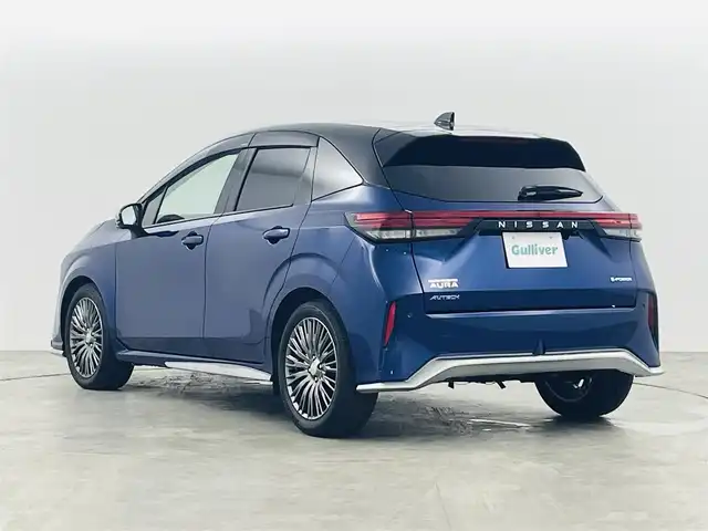 日産 オーラ オーテック 福島県 2025(令7)年 0.3万km オーロラフレアブルーパール /スーパーブラック 2トーン インテリジェントエマージェンシーブレーキ/・緊急停止支援システム/・前方衝突予測警報/・アダプティブLEDヘッドライト/・ふらつき防止装置/・標識検知機能/・車線逸脱警報装置/・後側方衝突防止支援システム/・後側方車両検知警報/・アラウンドビューモニター/・踏み間違い衝突防止アシスト/・後退時車両検知警報/純正9インチナビ/（TV/BT/AM・FM/HDMI）/・バックカメラ/ビルトインETC/デジタルインナーミラー/純正17インチアルミ/電子パーキング/・オートブレーキホールド/ブラインドスポットモニター/ヘッドアップディスプレイ/プッシュスタート/・スマートキー/純正フロアマット/D席パワーシート/・レザーシート/プッシュスタート/LEDライト/・オートライト/電動格納ミラー/ドアバイザー