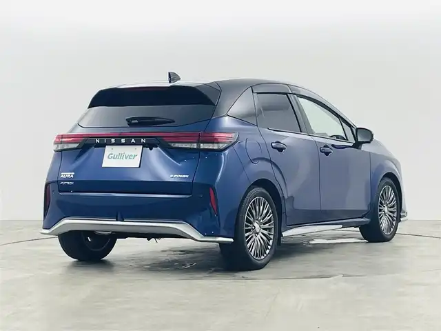 日産 オーラ オーテック 福島県 2025(令7)年 0.3万km オーロラフレアブルーパール /スーパーブラック 2トーン インテリジェントエマージェンシーブレーキ/・緊急停止支援システム/・前方衝突予測警報/・アダプティブLEDヘッドライト/・ふらつき防止装置/・標識検知機能/・車線逸脱警報装置/・後側方衝突防止支援システム/・後側方車両検知警報/・アラウンドビューモニター/・踏み間違い衝突防止アシスト/・後退時車両検知警報/純正9インチナビ/（TV/BT/AM・FM/HDMI）/・バックカメラ/ビルトインETC/デジタルインナーミラー/純正17インチアルミ/電子パーキング/・オートブレーキホールド/ブラインドスポットモニター/ヘッドアップディスプレイ/プッシュスタート/・スマートキー/純正フロアマット/D席パワーシート/・レザーシート/プッシュスタート/LEDライト/・オートライト/電動格納ミラー/ドアバイザー