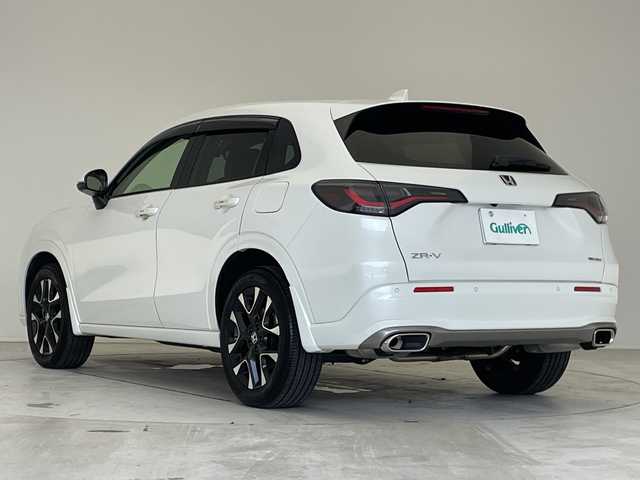 ホンダ ＺＲ－Ｖ ハイブリッド e:HEV Z 愛知県 2024(令6)年 1.5万km プラチナホワイトパール ホンダセンシング/BOSEプレミアムサウンド/純正9インチディスプレイオーディオナビ（あり）/全方位カメラ/レーダークルーズコントロール/シートヒーター/バックカメラ/電動リアゲート/パワーシート/コーナーセンサー/純正アルミホイール/ETC2.0/ブラインドスポットモニター/LEDヘッドライト/ステアリングヒーター/パドルシフト/ダウンヒルアシストコントロール/オートマチックハイビーム/ドライブレコーダー/ワイヤレス充電器/衝突被害軽減ブレーキ/フルセグTV/Bluetooth/ステアリングスイッチ/スマートキー/プッシュスタート