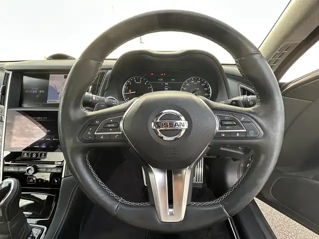 日産 スカイライン ハイブリッド GT タイプSP 新潟県 2020(令2)年 4.8万km ダークメタルグレー 衝突軽減/プロパイロット2.0/全方位カメラ/純正ナビ/(AM/FM/CD/DVD/BT/フルセグ)/ETC2.0/アンビエントLEDライトシステム/追従クルーズコントロール/アイドリングストップ/コーナーセンサー/BSM/本革シート/シートヒーター/パドルシフト/革巻きステアリング/ステアリングスイッチ/AUTOライト/LEDヘッドライト/横滑り防止/プッシュスタート/スマートキー