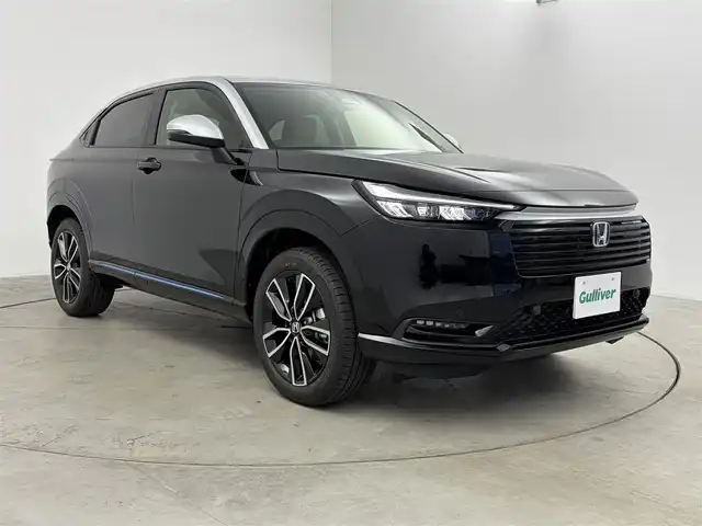 ホンダ ヴェゼル ハイブリッド e:HEV Z PLaYパッケージ 愛知県 2025(令7)年 0.1万km 黒Ⅱ ・純正ディスプレイナビ/（BT/Carplay/USB）/・フルセグTV/・バックカメラ/・電動パーキングシステム/・電動バックドア/・ハーフレザーシート/・前席シートヒーター/・ホンダセンシング/レーダークルーズコントロール/衝突軽減ブレーキ/レーンアシストシステム/ブラインドスポットモニター/コーナーセンサー/・クイック充電/・ステアリングヒーター/・パドルシフト/・純正１８インチAW/225/50/R18/・ETC2.0/・純正LEDライト/・保証書/・取扱説明書