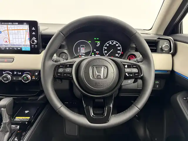ホンダ ヴェゼル ハイブリッド e:HEV Z PLaYパッケージ 愛知県 2025(令7)年 0.1万km 黒Ⅱ ・純正ディスプレイナビ/（BT/Carplay/USB）/・フルセグTV/・バックカメラ/・電動パーキングシステム/・電動バックドア/・ハーフレザーシート/・前席シートヒーター/・ホンダセンシング/レーダークルーズコントロール/衝突軽減ブレーキ/レーンアシストシステム/ブラインドスポットモニター/コーナーセンサー/・クイック充電/・ステアリングヒーター/・パドルシフト/・純正１８インチAW/225/50/R18/・ETC2.0/・純正LEDライト/・保証書/・取扱説明書