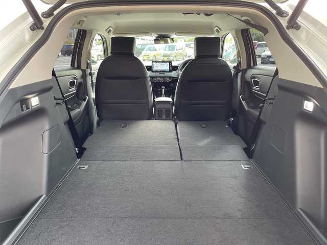 ホンダ ヴェゼル ハイブリッド e:HEV Z 愛知県 2025(令7)年 0.1千km プラチナホワイトパール ホンダセンシング/純正9型ディスプレイオーディオナビ/レーダークルーズコントロール/シートヒーター/バックカメラ/電動リアゲート/コーナーセンサー/純正アルミホイール/ETC2.0/ブラインドスポットモニター/LEDヘッドライト/ステアリングヒーター/ワイヤレス充電機/オートマチックハイビーム/ダウンヒルアシストコントロール/衝突軽減システム/フルセグ/Bluetooth/ステアリングスイッチ/スマートキー/プッシュスタート