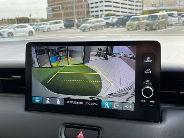 ホンダ ヴェゼル ハイブリッド e:HEV Z 愛知県 2025(令7)年 0.1千km プラチナホワイトパール ホンダセンシング/純正9型ディスプレイオーディオナビ/レーダークルーズコントロール/シートヒーター/バックカメラ/電動リアゲート/コーナーセンサー/純正アルミホイール/ETC2.0/ブラインドスポットモニター/LEDヘッドライト/ステアリングヒーター/ワイヤレス充電機/オートマチックハイビーム/ダウンヒルアシストコントロール/衝突軽減システム/フルセグ/Bluetooth/ステアリングスイッチ/スマートキー/プッシュスタート