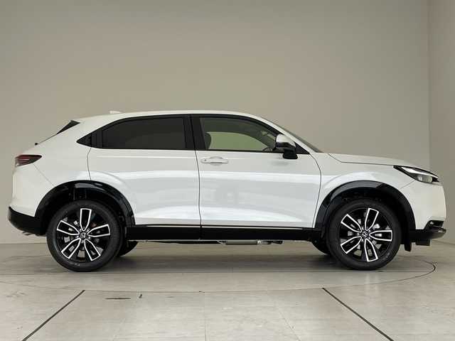 ホンダ ヴェゼル ハイブリッド e:HEV Z 愛知県 2025(令7)年 0.1千km プラチナホワイトパール ホンダセンシング/純正9型ディスプレイオーディオナビ/レーダークルーズコントロール/シートヒーター/バックカメラ/電動リアゲート/コーナーセンサー/純正アルミホイール/ETC2.0/ブラインドスポットモニター/LEDヘッドライト/ステアリングヒーター/ワイヤレス充電機/オートマチックハイビーム/ダウンヒルアシストコントロール/衝突軽減システム/フルセグ/Bluetooth/ステアリングスイッチ/スマートキー/プッシュスタート