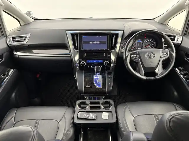 トヨタ ヴェルファイア Z Aエディション 福岡県 2017(平29)年 7.7万km バーニングブラッククリスタルシャインガラスフレーク ＴＲＤエアロ　/後席モニター　/純正９型ナビ（フルセグＴＶ）　/両側電動スライドドア　/クルーズコントロール　/衝突軽減　/コーナーセンサー　/レーンキープ　/オートライト　/横滑り防止　/オットマン　/ビルトインＥＴＣ