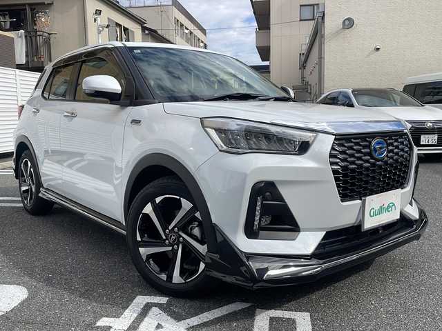 ダイハツ ロッキー プレミアム G HEV 広島県 2024(令6)年 0.6万km シャイニングホワイトパール /登録時走行距離/　　　　　　　5434キロ/ワンオーナー/社外ナビ/バックカメラ/地デジ/エアロ/シートヒーター/クルーズコントロール/スペアキー×１/ビルトインETC/新車時整備手帳/　　【保証書】/取扱説明書/
