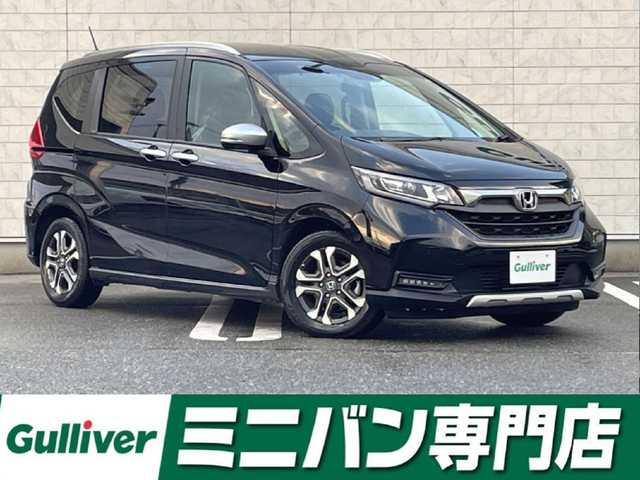 ホンダ フリード ハイブリット クロスター 福岡県 2022(令4)年 1.7万km クリスタルブラックパール 純正9型SDナビ(フルセグTV/CD/DVD/BT)/バックカメラ/コーナーセンサー/ホンダセンシング/ドラレコ/両側電動/クルコン/ETC/シートヒーター/USB/純正フロアマット/純正LED/純正アルミホイール/プッシュスタート/スマートキー