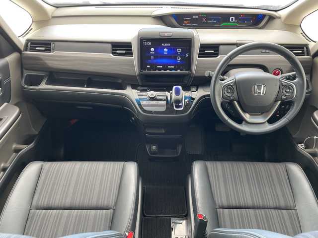 ホンダ フリード ハイブリット G ホンダセンシング 沖縄県 2018(平30)年 1.9万km 赤 純正９インチナビ　（VXM-197VFNi）/（フルセグTV　BLUETOOTH　SD　CD　DVD)　/バックカメラ　/ドライブレコーダー　/ＥＴＣ　/両側パワースライドドア　/ホンダセンシング/クルーズコントロール　/ＬＥＤヘッドライト　/オートライト　/スマートキー/プッシュスタート/オートエアコン/純正15インチアルミホイール/純正フロアマット