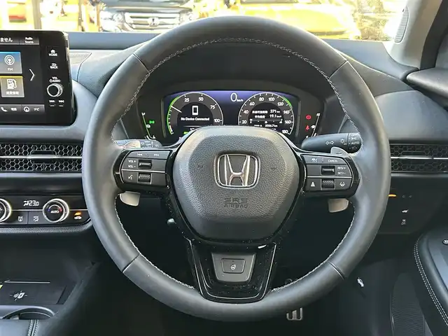 ホンダ ＺＲ－Ｖ ハイブリッド e:HEV Z 静岡県 2024(令6)年 0.4万km スーパープラチナグレーメタリック ワンオーナー/純正ナビ/フルセグTV/BT/USB/全方位カメラ/BOSEサウンドシステム/黒革シート/前席パワーシート/前席シートヒーター /運転席シートメモリー/パワーバックドア/前後ドライブレコーダー/衝突軽減ブレーキ/レーンキープアシスト/ブラインドスポットモニター/レーダークルーズコントロール/クリアランスソナー/置くだけ充電/ステアリングヒーター/ビルトインETC2.0/純正18インチAW/スマートキー×2/保証書/取扱説明書