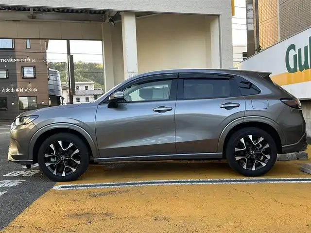 ホンダ ＺＲ－Ｖ ハイブリッド e:HEV Z 静岡県 2024(令6)年 0.4万km スーパープラチナグレーメタリック ワンオーナー/純正ナビ/フルセグTV/BT/USB/全方位カメラ/BOSEサウンドシステム/黒革シート/前席パワーシート/前席シートヒーター /運転席シートメモリー/パワーバックドア/前後ドライブレコーダー/衝突軽減ブレーキ/レーンキープアシスト/ブラインドスポットモニター/レーダークルーズコントロール/クリアランスソナー/置くだけ充電/ステアリングヒーター/ビルトインETC2.0/純正18インチAW/スマートキー×2/保証書/取扱説明書
