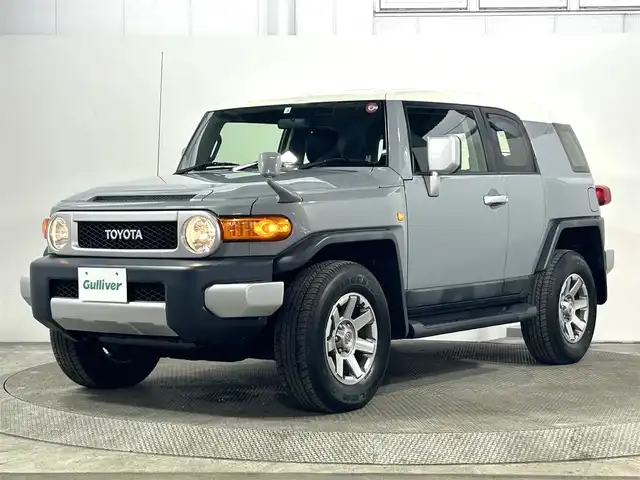 トヨタ ＦＪクルーザー カラーパッケージ 大阪府 2014(平26)年 4.3万km セメントグレーM/ホワイト 純正ナビ(フルセグTV/DVD再生/Bluetooth) ETC クルコン クリアランスソナー 横滑り防止 リモコンキー 純正マット 純正アルミホイール ４WD