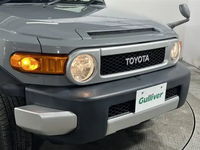 トヨタ ＦＪクルーザー カラーパッケージ 大阪府 2014(平26)年 4.3万km セメントグレーM/ホワイト 純正ナビ(フルセグTV/DVD再生/Bluetooth) ETC クルコン クリアランスソナー 横滑り防止 リモコンキー 純正マット 純正アルミホイール ４WD