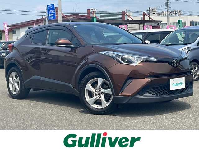 トヨタ Ｃ－ＨＲ S－T 秋田県 2018(平30)年 10.1万km ダークブラウンマイカメタリック 純正SDナビ/バックカメラ/フルセグTV/純正ビルトインETC/クルーズコントロール(追従走行なし)/衝突被害軽減システム/車線逸脱警報/盗難防止装置/オートマチックハイビーム/レーンキープアシスト/純正AW/エンジンスターター