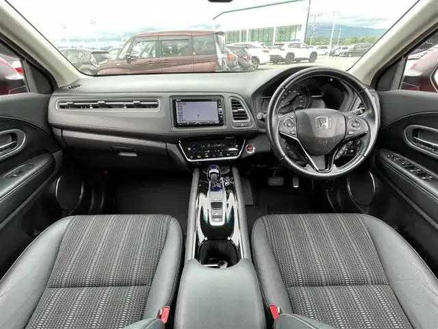 ホンダ ヴェゼル ハイブリッド Z ホンダセンシング 佐賀県 2018(平30)年 5.1万km プレミアムクリスタルレッドM ワンオーナー/純正メモリナビ/フルセグTV/・CD/DVD/SD/USB/Bluetooth/バックカメラ/前方ドライブレコーダー/ビルトインETC/電子パーキングブレーキ/BRAKE　HOLD機能/パドルシフト/ハーフレザーシート/D＋N席シートヒーター/革巻きステアリング/ステアリングリモコン/純正17インチアルミホイール/純正LEDヘッドライト/純正LEDフォグライト/純正フロアマット/純正ドアバイザ―/新車保証書/取扱説明書/スペアキー１本/ホンダセンシング/・アダプティブクルーズコントロール/・路外逸脱抑制システム/・衝突軽減ブレーキ/・先行車発進お知らせ機能/・リアクティブフォースペダル/・標識認識機能
