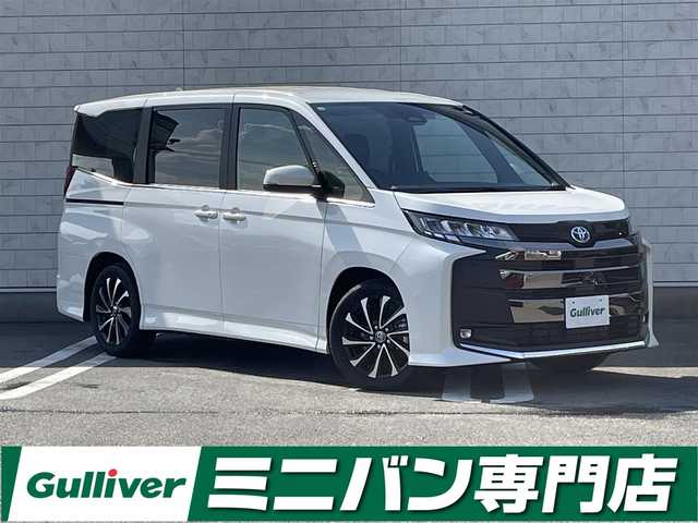 トヨタ ノア ハイブリッド S－Z 福岡県 2025(令7)年 0.1万km未満 ホワイトパールクリスタルシャイン 登録済み未使用車純正８型ディスプレイオーディオ(CarPlay/BT)バックモニター快適利便パッケージHiトヨタセーフティセンスコーナーセンサー電動リアゲート両側電動レーダークルコンシートヒーターハンドルヒーターオートホールドAC100Vコンセントtype C 純正LEDヘッドライト純正アルミホイール純正フロアマットスマートキープッシュスタート