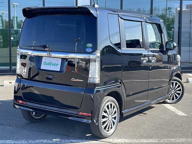 ホンダ Ｎ ＢＯＸ カスタム ターボ SSパッケージ 道東・釧路十勝 2015(平27)年 7.8万km スマートブラック ・４WD/・ターボ/・社外ＳＤメモリナビ/（FM AM DVD CD SD フルセグ Bluetooth）/・バックカメラ/・パドルシフト/・オートライト/・ETC/・衝突軽減システム（CTBA）/・前席シートヒーター/・ヒーテッドドアミラー/・アイドリングストップ/・横滑り防止装置/・スマートキー/・プッシュスタート/・純正ロアマット/・社外前方ドライブレコーダー/・純正15インチアルミホイール